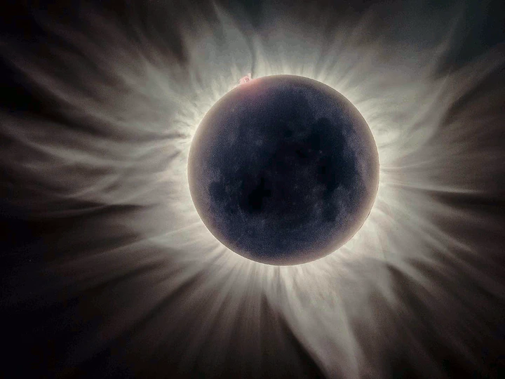 The moon eclipses the sun.